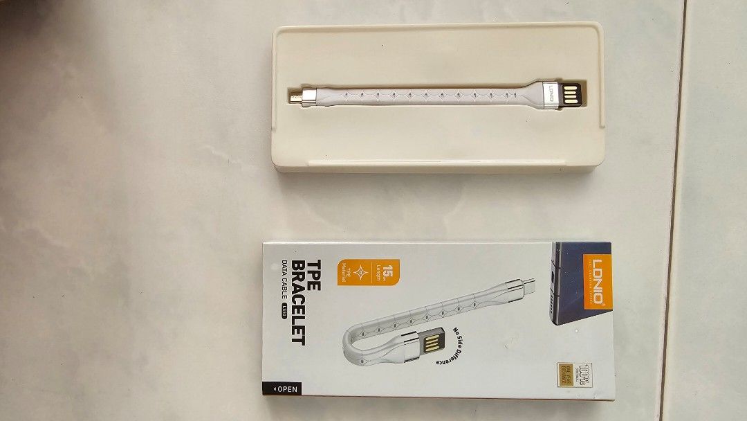 Data cable (Category: Cables & Adaptors) located in Singapore. Submitted by laughter5691 (Listing ID 1340157174, Image 1). Description: brand new data cable.