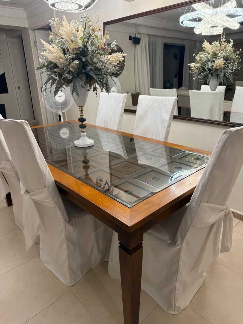 Dining Table (Category: Tables & Sets) located in Singapore. Submitted by sonbonnie (Listing ID 1340256286, Image 1). Description: ORIGINAL TEAKWOOD DINING TABLE - sits 6-8 chairs - measurement: 200 x 100 x 79 - still in very good condition - chairs not included - NEGOTIABLE.