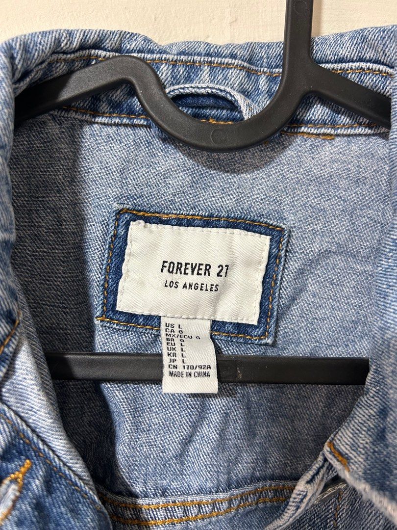 FOREVER21 Denim Jacket (Category: Coats, Jackets and Outerwear) located in Bulacan. Submitted by declutterplus (Listing ID 1340162273, Image 2). Description: Bought in US. Fits M - L.