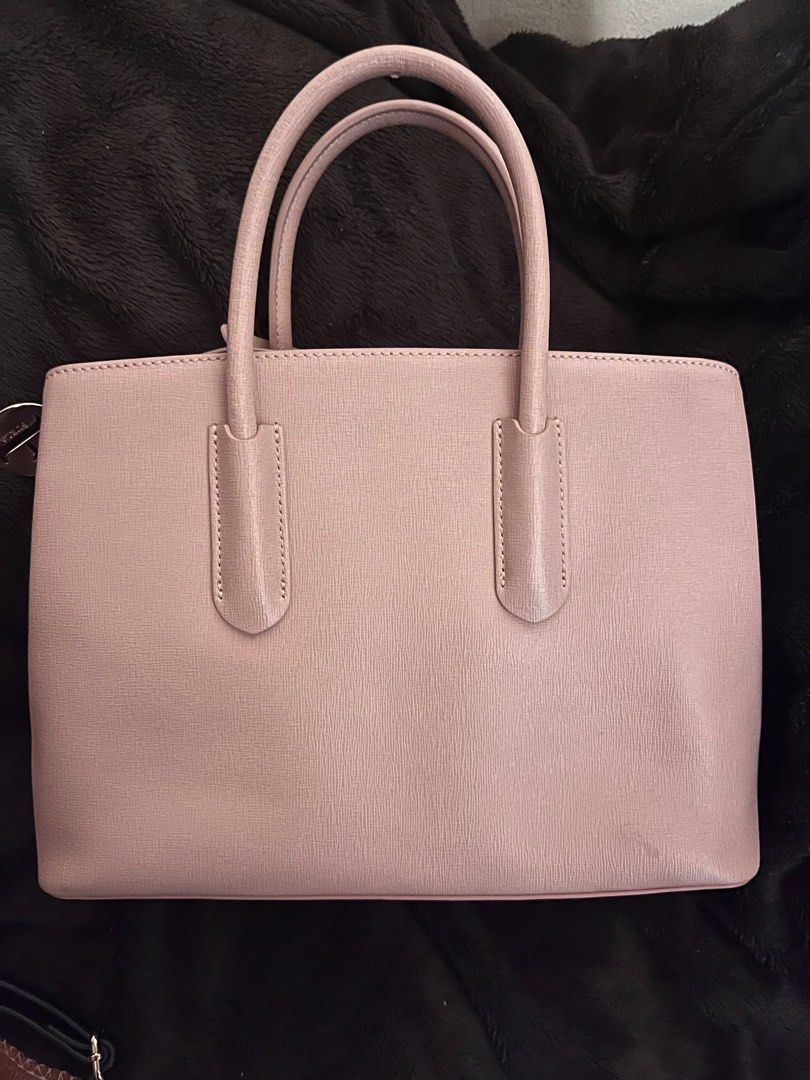 Furla Tessa Medium Two-Way Bag - Excellent Condition (Category: Luxury Bags & Wallets) located in Manila. Submitted by myday1101 (Listing ID 1340265722, Image 3). Description: Furla Tessa Medium Two-Way Bag - Elegant Light Pink (manage expectations due to lighting) Material: Genuine Saffiano Leather (durable and scratch-resistant) - Two-way design: Top handles for hand-carry and detachable strap for shoulder wear. - Spacious interior with triple 