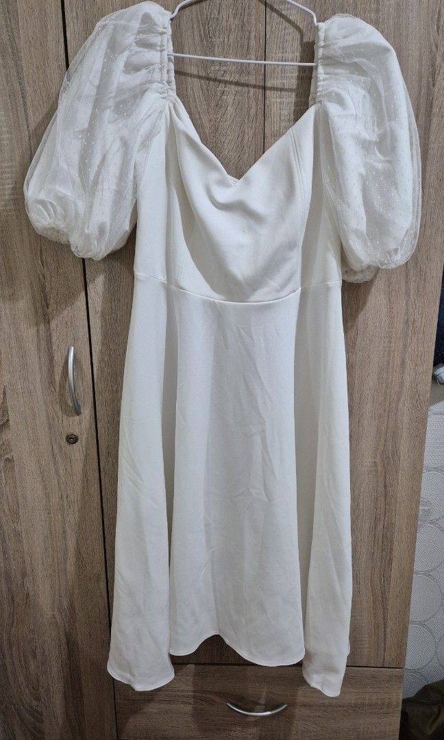 Karimadon Dress Sofia White XL (Category: Dresses) located in Taguig. Submitted by aj.declutter (Listing ID 1340178820, Image 2). Description: - Used only twice for grad and some wedding event Balloon Sleeves Fit and Flare Dress Fabric: Neoprene and Dotted Tulle Size (Inches): Bust • Waist • Hips • Length L: B-38”, W-32”, H-40”, L-38” RFS: Not being used.