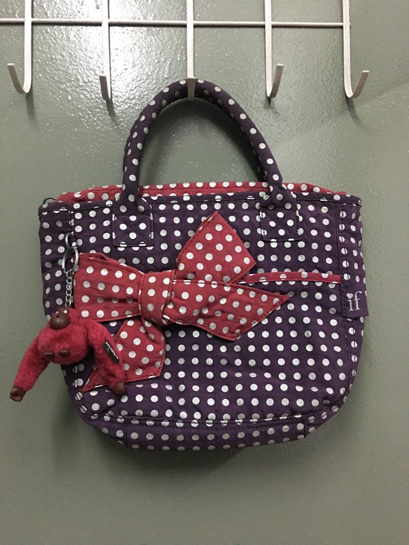 Kipling authentic (Category: Tote Bags) located in Kuala Lumpur. Submitted by lara2017 (Listing ID 1340268962, Image 1). Description: Kipling authentic.material nylon.if collection .warna purple polka dot.Tiada lubang Tiada koyak.beg sangat bagus dan baik.tinggi 20cm lebar 6cm panjang 24cm.