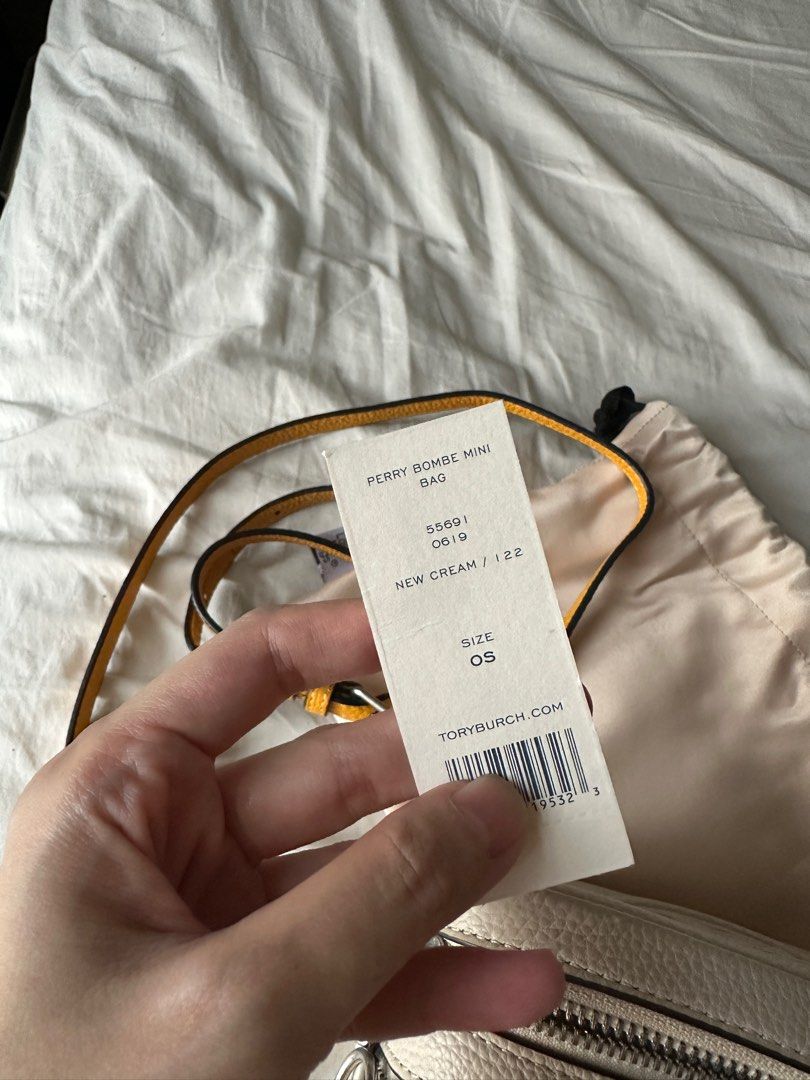 Tory Burch • Perry Bombe Mini (Category: Luxury Bags & Wallets) located in San Juan City. Submitted by tinywaddles (Listing ID 1340221357, Image 2). Description: Tory Burch • Perry Bombe Mini in New Cream Used around 5x only Genuine Leather with tag Php 14,000 I’ll try to look for the original dustbag 😝.