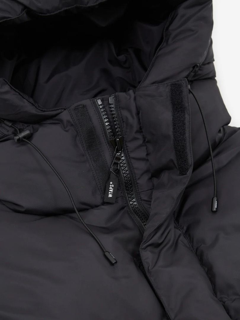 Wtaps Down Jacket (Category: Coats, Jackets and Outerwear) located in Singapore. Submitted by visualuparmored (Listing ID 1340170339, Image 3). Description: Rare size. Worn for 3 days in Tokyo during winter..