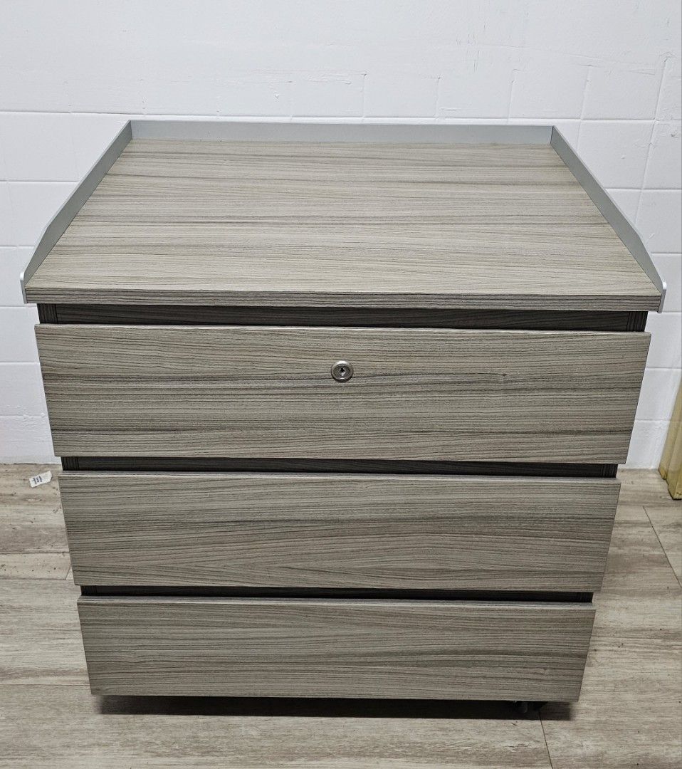 Bedside Table (Category: Shelves, Cabinets & Racks) located in Singapore. Submitted by don.deguzman.25 (Listing ID 1340465602, Image 1). Description: Laminated drawer cabinet Length - 60cm Width - 48cm Height - 67cm.