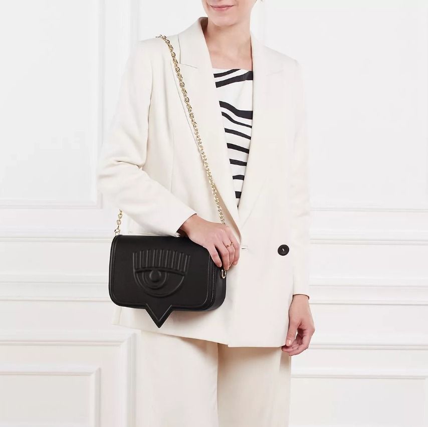 CHIARA FERRAGNI EYELIKE BIG BAG (Category: Luxury Bags & Wallets) located in Surigao. Submitted by SecondChances_1993 (Listing ID 1340428231, Image 3). Description: Selling Low <3 CHIARA FERRAGNI EYELIKE BIG BAG Complete Inclusions 2 Slings, Dust Bag and Box Used once RFS : Need Funds *Box has a minimal issue pero the quality of everything is still superb! .