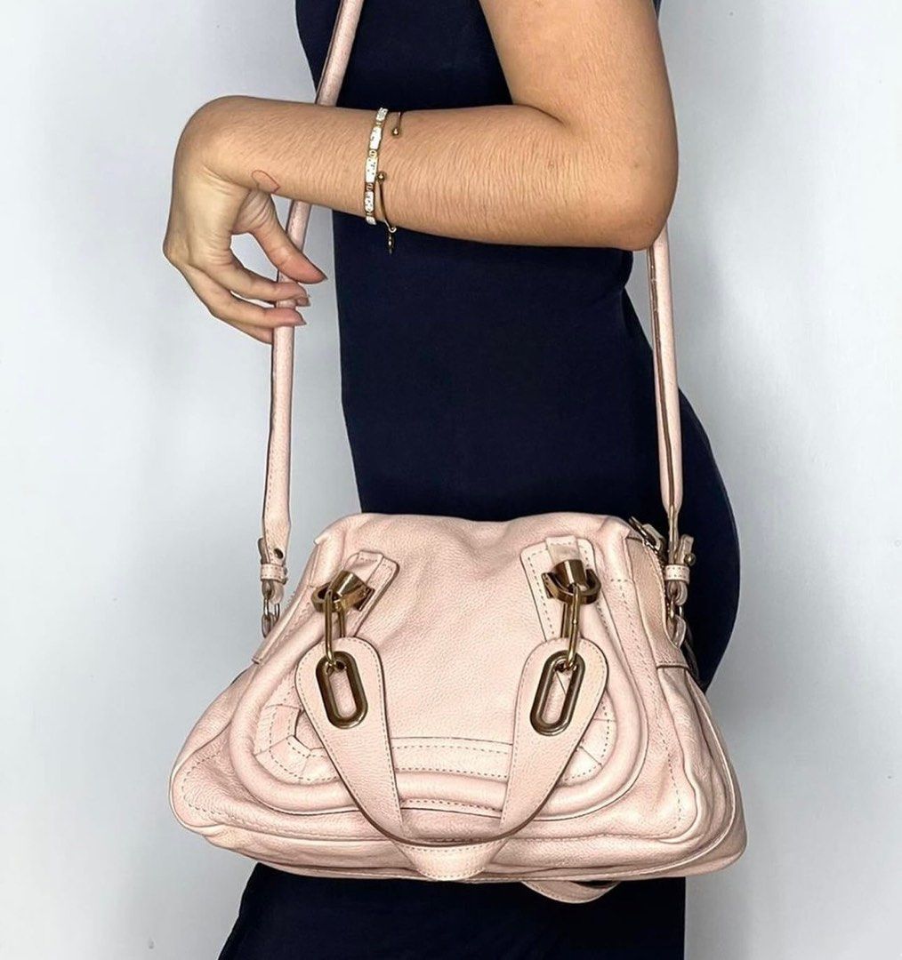 Chloe Paraty Pink (Category: Luxury Bags & Wallets) located in Manila. Submitted by luxuryprelovedbagsby_by_agnes (Listing ID 1340423210, Image 3). Description: CHLOE💗 Calfskin Small Paraty light Pink The Chloe Light Pink Pebbled Leather Small Paraty Bag is causing a huge buzz among fashionistas and has been seen on celebrities such as Katie Holmes and Rachel Zoe. This stylish bag with it’s trim details and sleek shape features an ultra-roomy in