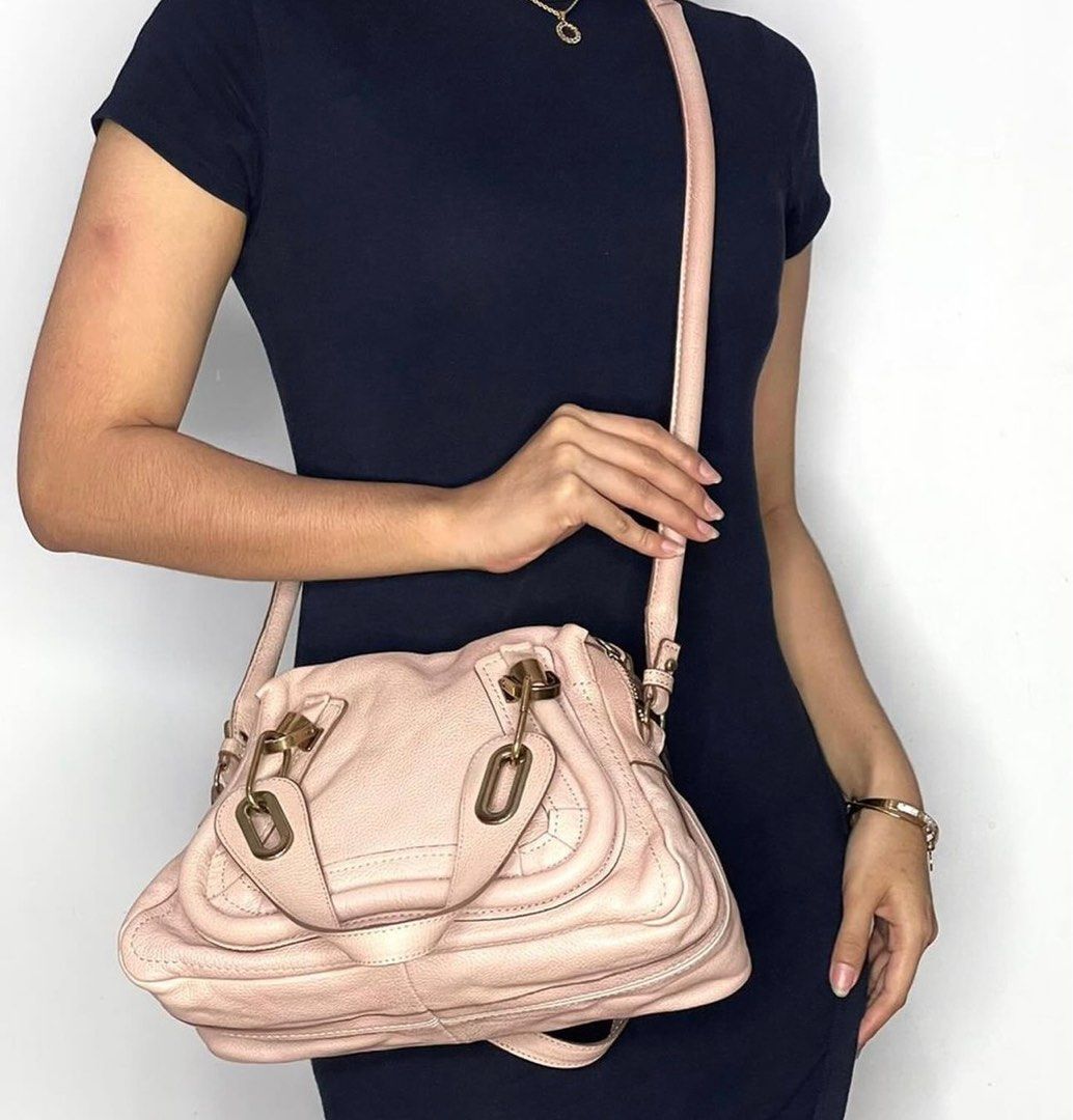 Chloe Paraty Pink (Category: Luxury Bags & Wallets) located in Manila. Submitted by luxuryprelovedbagsby_by_agnes (Listing ID 1340423210, Image 2). Description: CHLOE💗 Calfskin Small Paraty light Pink The Chloe Light Pink Pebbled Leather Small Paraty Bag is causing a huge buzz among fashionistas and has been seen on celebrities such as Katie Holmes and Rachel Zoe. This stylish bag with it’s trim details and sleek shape features an ultra-roomy in
