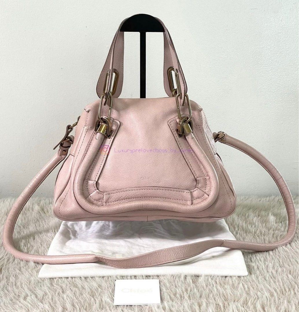 Chloe Paraty Pink (Category: Luxury Bags & Wallets) located in Manila. Submitted by luxuryprelovedbagsby_by_agnes (Listing ID 1340423210, Image 1). Description: CHLOE💗 Calfskin Small Paraty light Pink The Chloe Light Pink Pebbled Leather Small Paraty Bag is causing a huge buzz among fashionistas and has been seen on celebrities such as Katie Holmes and Rachel Zoe. This stylish bag with it’s trim details and sleek shape features an ultra-roomy in