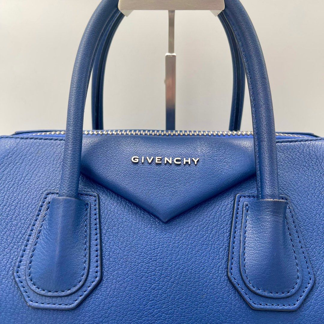 Givenchy Antigona Electric Blue Medium Handbag, SHW (Category: Luxury Bags & Wallets) located in Mandaluyong City. Submitted by thehouseofpurses_byivana1 (Listing ID 1340388800, Image 3). Description: ✨Givenchy Antigona Electric Blue Handbag, SHW✨ Size Medium 41x28x19cm or 16.1x11x7.4 inches Preloved and well cared for. No need to bring to a bag spa. See detailed pictures for the condition. Clean interior and exterior. No major flaws. Comes with 