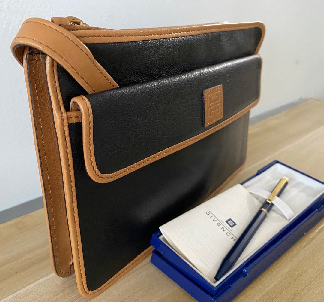Givenchy Vintage Clutch with Pen (Category: Luxury Bags & Wallets) located in Cebu City. Submitted by thedeclutteringmom (Listing ID 1340302287, Image 2). Description: Guaranteed original In very good condition Classic and elegant Durable soft leather Pen has no ink but I think it’s refillable .