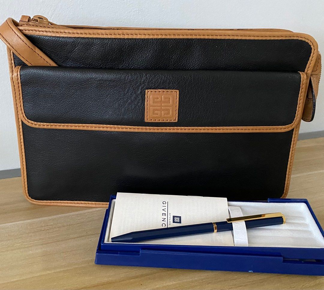Givenchy Vintage Clutch with Pen (Category: Luxury Bags & Wallets) located in Cebu City. Submitted by thedeclutteringmom (Listing ID 1340302287, Image 1). Description: Guaranteed original In very good condition Classic and elegant Durable soft leather Pen has no ink but I think it’s refillable .