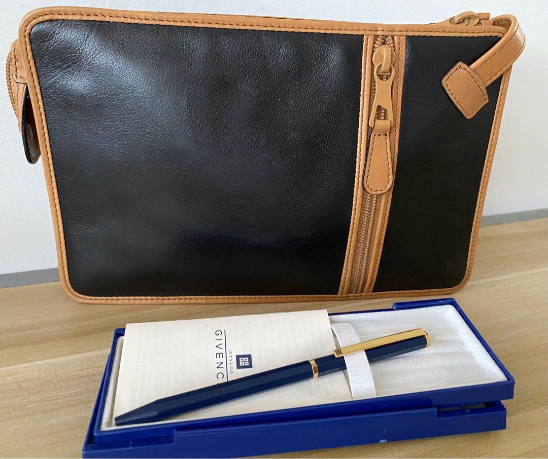 Givenchy Vintage Clutch with Pen (Category: Luxury Bags & Wallets) located in Cebu City. Submitted by thedeclutteringmom (Listing ID 1340302287, Image 3). Description: Guaranteed original In very good condition Classic and elegant Durable soft leather Pen has no ink but I think it’s refillable .