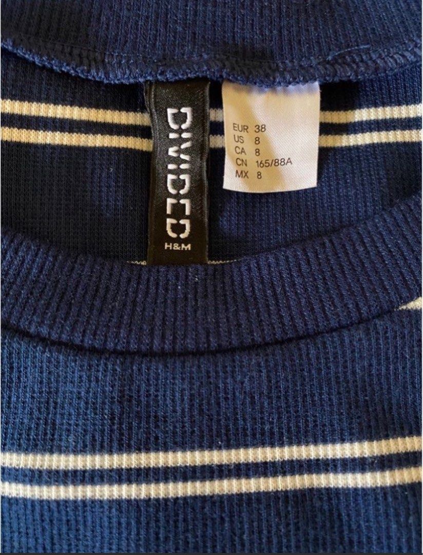 H&M DIVIDED Bodycon Knit Dress (Category: Dresses) located in Manila. Submitted by justinstyleee (Listing ID 1340303071, Image 3). Description: Dark Blue and White Striped Fitted knee -length dress in ribbed jersey with short sleeves Used only once good as new✨✨.
