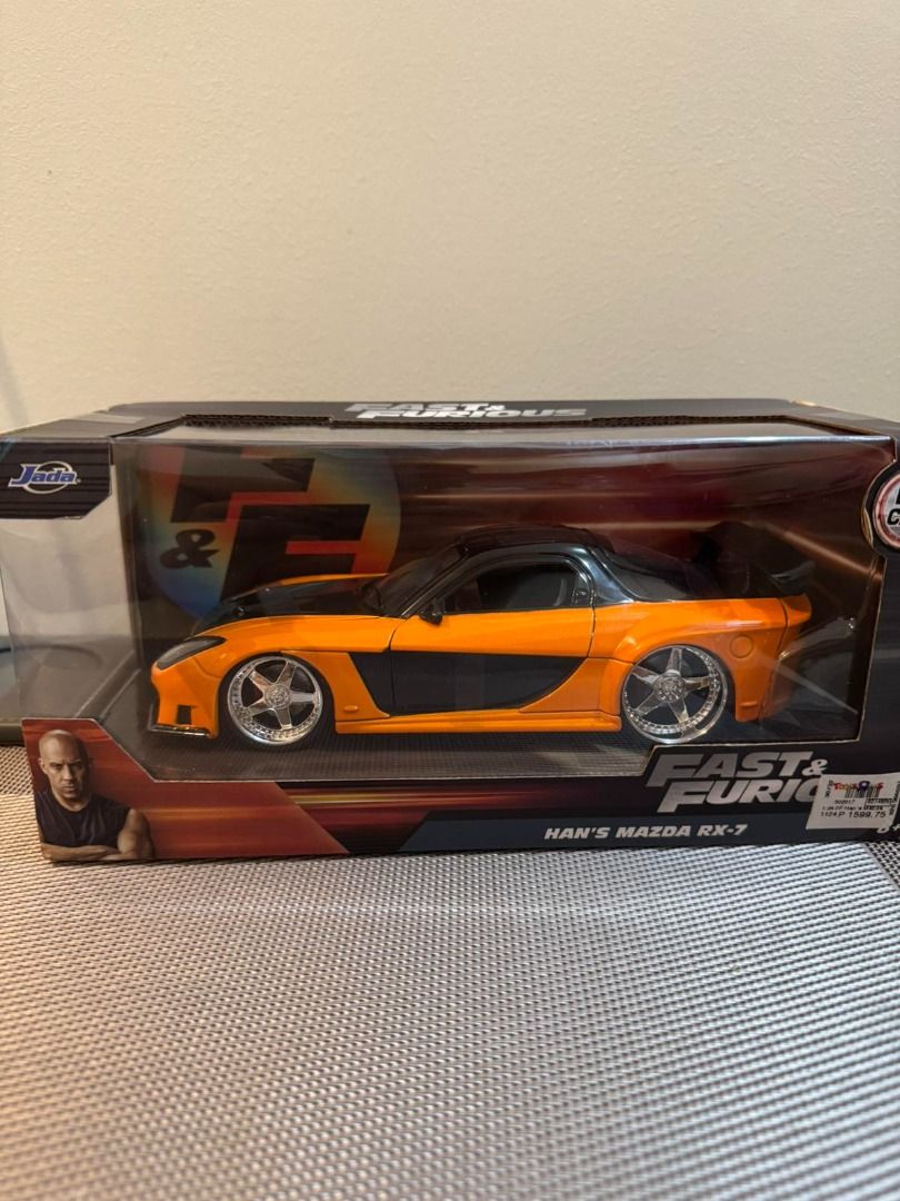Jada Han's Mazda RX-7 (1:24) (Category: Vehicle & Diecast Models) located in Pasig City. Submitted by zanderlouie24 (Listing ID 1340321391, Image 1). Description: Jada Han's Mazda RX-7 (1:24) +Shipping fee: Lalamove kung within Metro Manila and LBC pag outside Metro Manila.