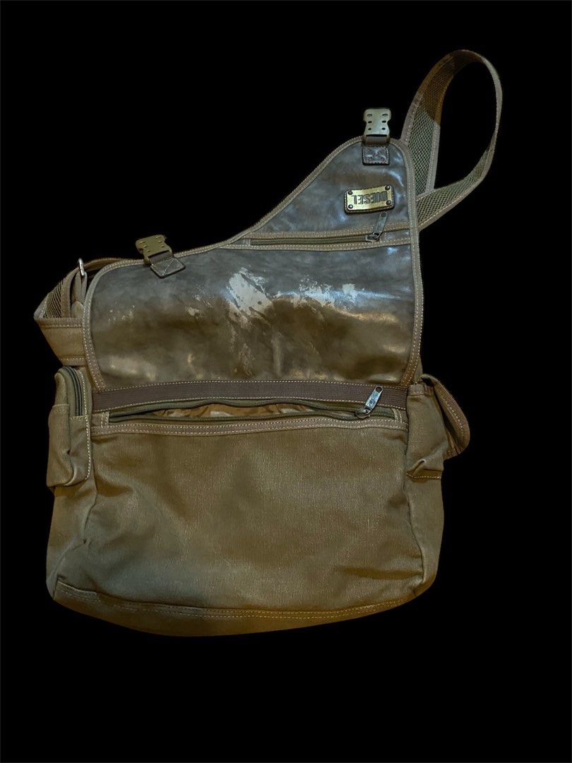 MESSENGER BAG DIESEL (Category: Backpacks) located in Manila. Submitted by worst (Listing ID 1340383111, Image 2). Description: +75 ship Issues: paint ng leather peel & signs of usage 13.5 inch length x 18 inch width .