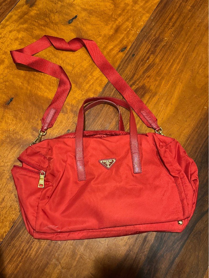 PRADA nylon bag (Category: Luxury Bags & Wallets) located in Quezon City. Submitted by ar_declutters (Listing ID 1340388112, Image 1). Description: Selling pre-loved Prada nylon bag in red 100% Authentic Inclusions: Bag with strap Dust bag Rfs: Decluttering.