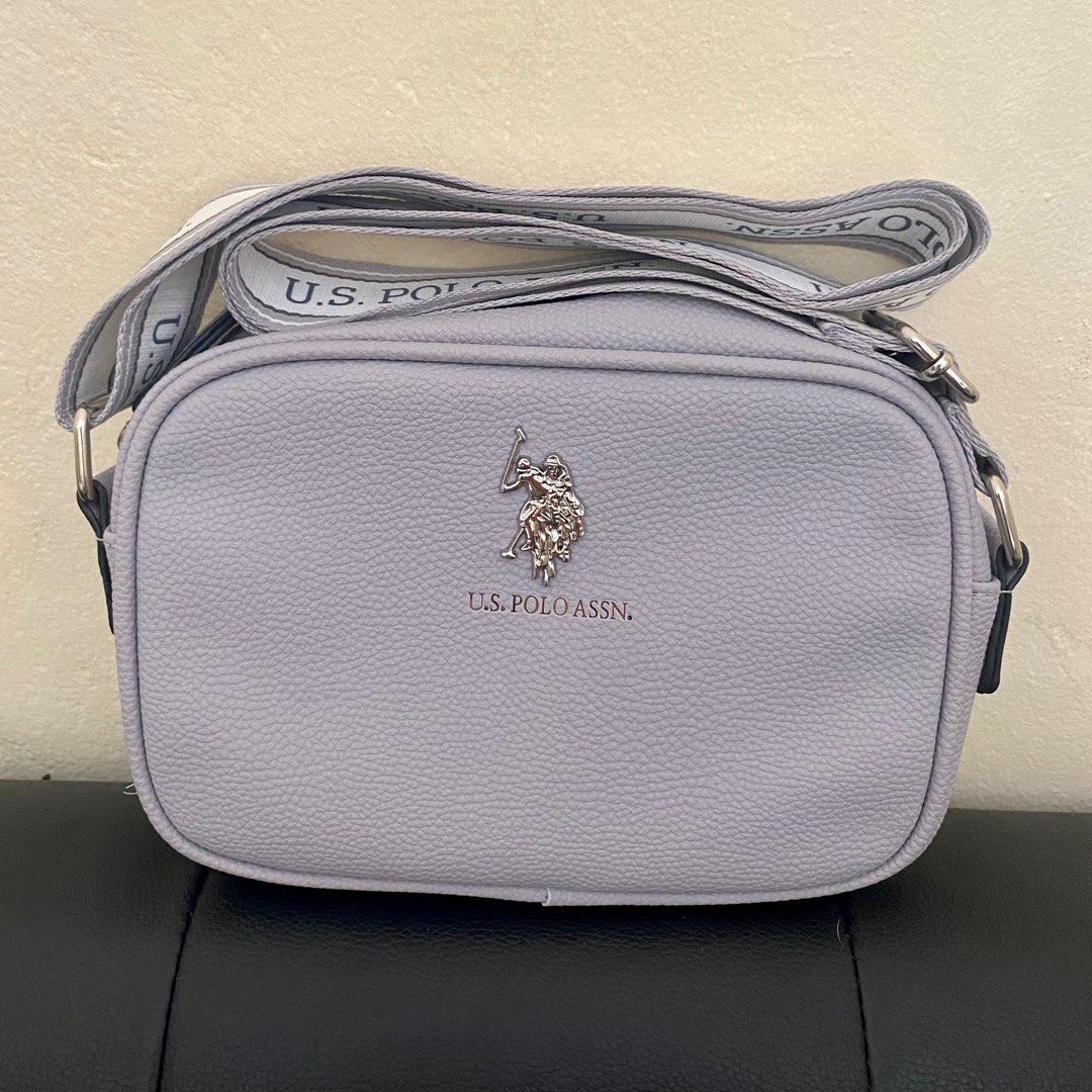 US Polo Assn. Sling Bag - Gray (Category: Cross-body Bags) located in General Trias. Submitted by itsevamarie (Listing ID 1340358209, Image 1). Description: Brand: US Polo Assn Condition: w/o tags but never used Flaws: none RFS: decluttering Mode of payment: BPI, GCash Will give discount if getting multiple items Shipping via Flash Express or J&T.