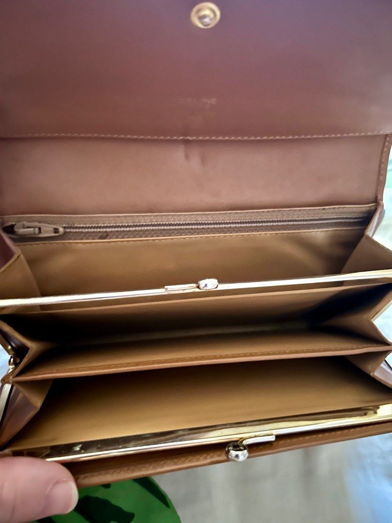 Vintage Celine bifold macadam wallet (Category: Luxury Bags & Wallets) located in Quezon City. Submitted by asiaco (Listing ID 1340336640, Image 3). Description: Pretty celine macadam wallet with kisslock coin compartment inside. Still fresh and slightly used. Little flaws because it is preloved. A collection piece. .