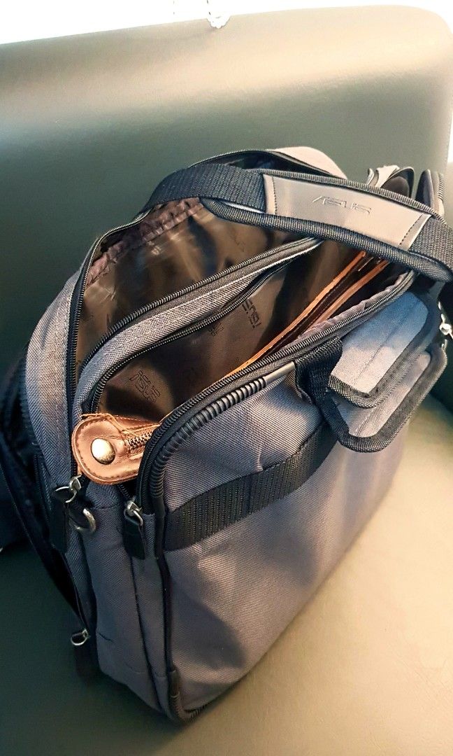 ASUS Laptop Travel Bag (Category: Laptops & Notebooks) located in Cavite. Submitted by jmy826 (Listing ID 1340587044, Image 2). Description: 🧡Preowned Travel Bag Brand: ☑ASUS 1,100 php Item condition and descriptions, Satisfactory bag upkeep and wear is almost unnoticeable. Still solid as new 👌 It is a 2 Large padded compartments bag can fit 15.7" laptop.. Has sub sections for your gadgets/accessories, and belongings.. Has trolley ready strap a