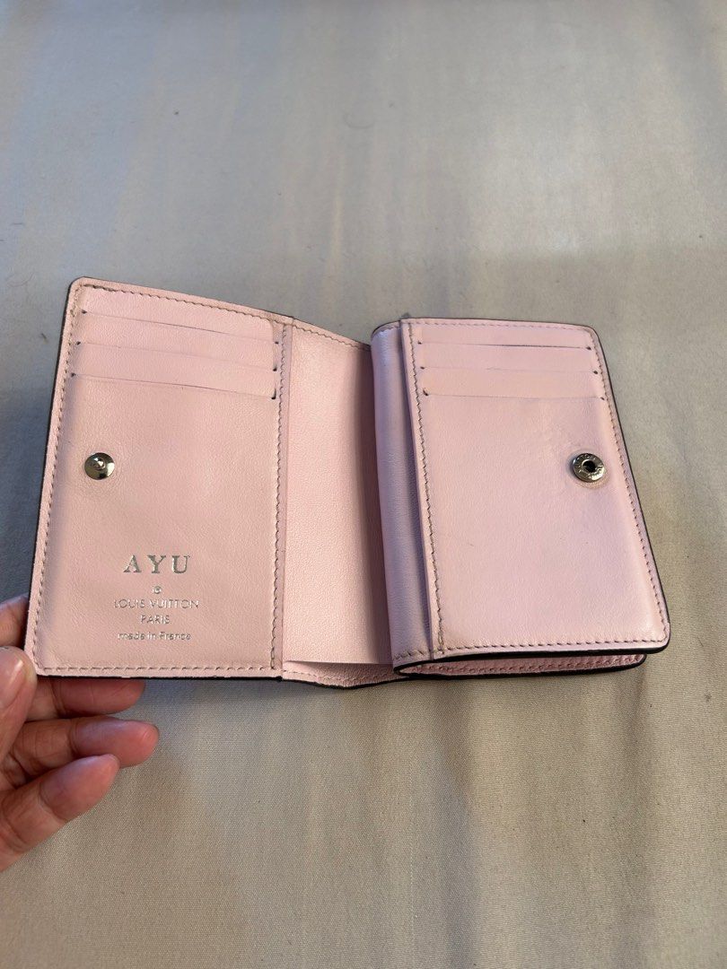 Authentic LV Mahina Bifold wallet (Category: Luxury Bags & Wallets) located in Dinalupihan. Submitted by hydzsalva (Listing ID 1340493803, Image 2). Description: Authentic LV Mahina Bifold Wallet flaw - with initials and snap is kinda loose but still functional thus selling for only 20% of the original price.