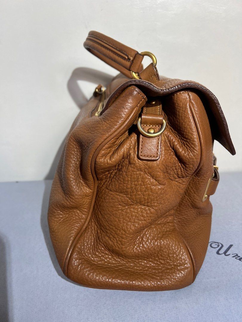Jill Stuart Handbag with Sling (Category: Luxury Bags & Wallets) located in Quezon City. Submitted by swiftiesince08 (Listing ID 1340532489, Image 3). Description: • hardware fadings (see last photo) • with sling • absorbent leather (notice the darker shades in the leather, i just cleaned it and absorbed the leather cleaner) Will update photos once bag is polished (might update price also).