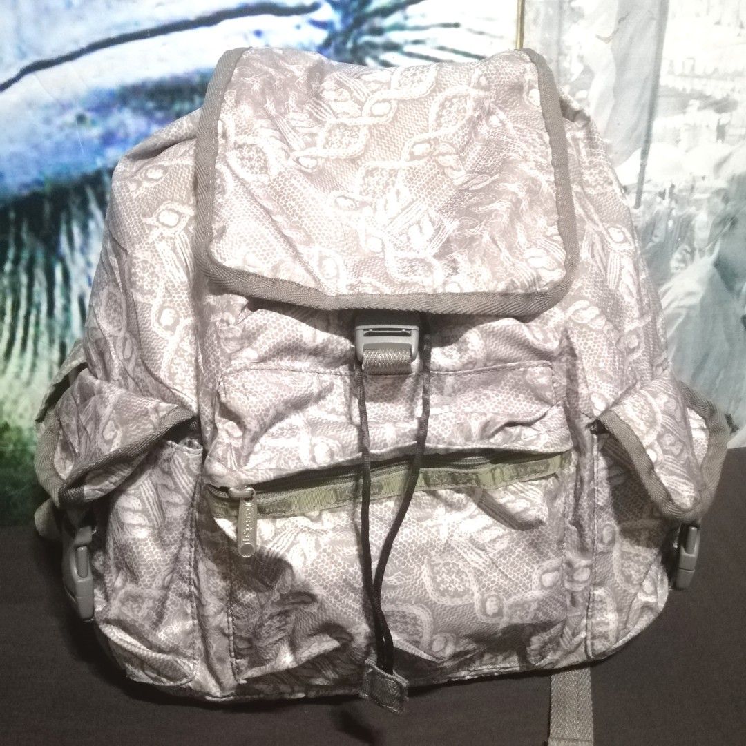 LESPORTSAC VOYAGER BACKPACK - FREE SF (Category: Backpacks) located in Davao. Submitted by bujoi12 (Listing ID 1340557083, Image 1). Description: Authentic LeSportsac Voyager Backpack In very good condition no issue / no flaws large size Drawstring / front buckle closure.