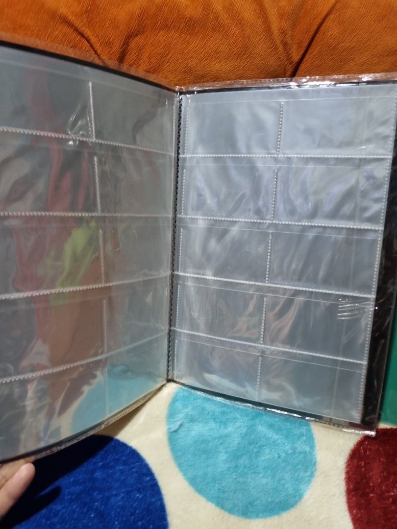 Photo Album and Name Card Holders Bundle (Category: Stationery & School Supplies) located in Paombong. Submitted by sweetdeals0181656 (Listing ID 1340618321, Image 3). Description: 2 pieces Photo Crayon Album 12 x 6 slots 2 pieces 100 pockets Name Card Holders.