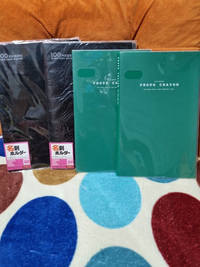 Photo Album and Name Card Holders Bundle (Category: Stationery & School Supplies) located in Paombong. Submitted by sweetdeals0181656 (Listing ID 1340618321, Image 1). Description: 2 pieces Photo Crayon Album 12 x 6 slots 2 pieces 100 pockets Name Card Holders.