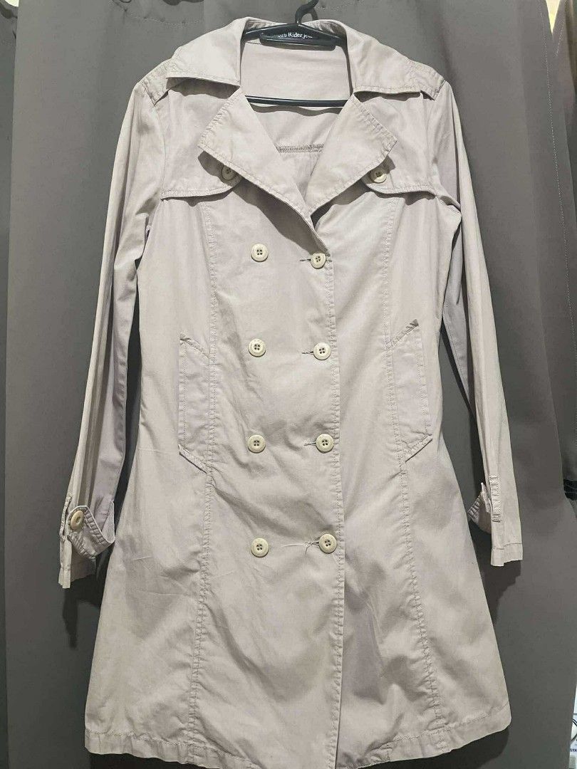 RRJ Double-breasted classic trench coat (Category: Coats, Jackets and Outerwear) located in Rizal. Submitted by oncelovedbysherry (Listing ID 1340511079, Image 1). Description: Beige double-breasted trench coat with wide lapels and 2 working pockets. Lightweight. Classic trench coat styling with adjustable straps on the sleeves. Bought this in the physical store. Never used. RFS: Too tight in my arms 🥲 SF will be shouldered by buyer. Length: 33 