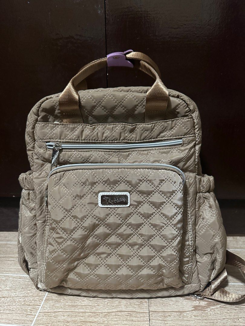 Ruffles Backpack - Brown / Mocha Mousse Color (Category: Backpacks) located in Marikina City. Submitted by geirampin (Listing ID 1340659693, Image 1). Description: ♡ used once to fit laptop ♡ has laptop slot + many compartments ♡ suitability & aesthetic are 💯 ♡ bought for 1k in sm dept store pls check bio for mop & mod.