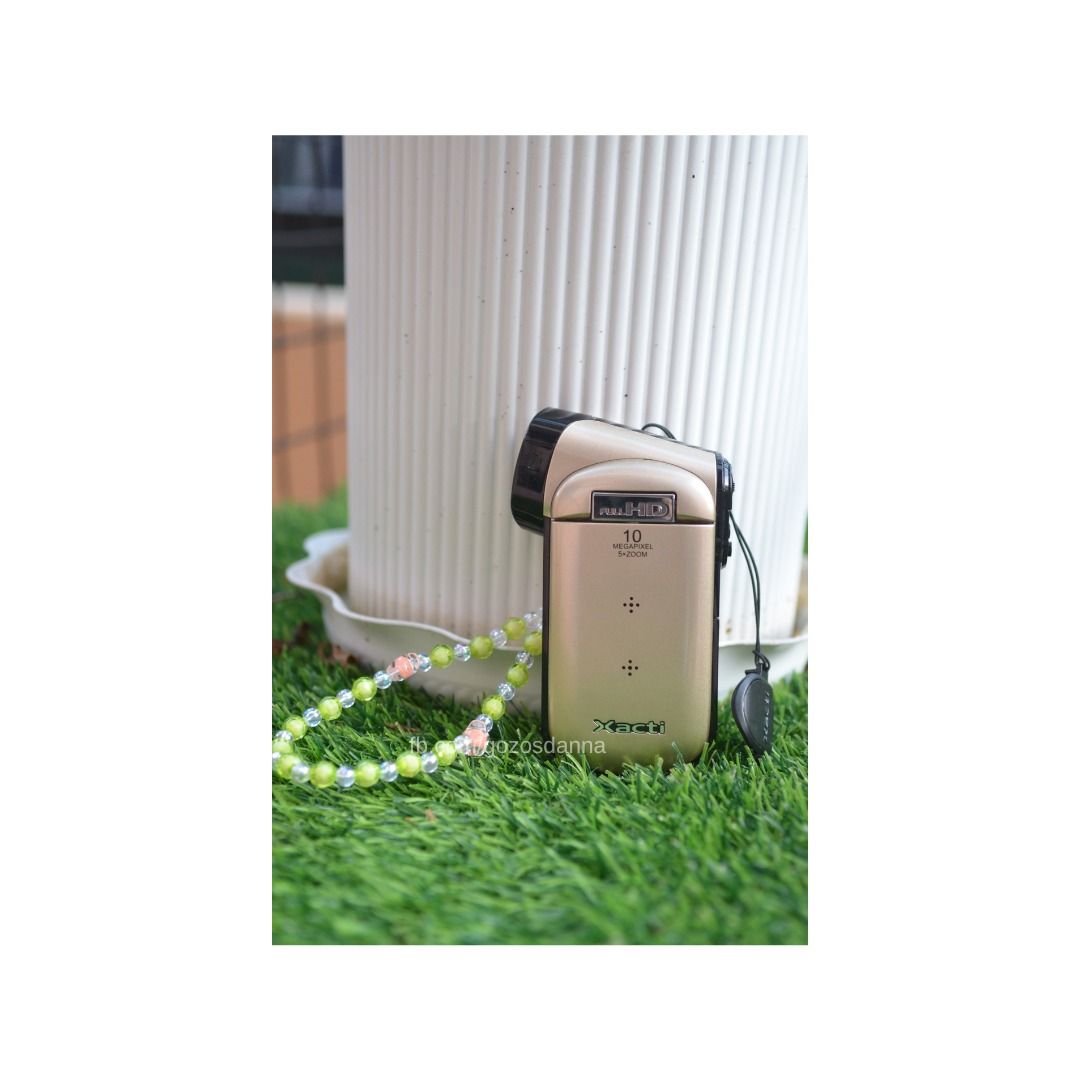 Sanyo VPC-CG20 Camcorder [Gold] (Category: Video Cameras) located in Lipa City. Submitted by gozosdanna (Listing ID 1340630292, Image 2). Description: Sanyo VPC-CG20 Camcorder [Gold] — ₱3,999 only (negotiable, send a dm!) ✧ Camcorder with flash ✧ 100% Working ❗READY TO USE.❗ ✧ 10 Megapixels. ✧ Body Condition 9.8/10 (Light scratches) ✧ All buttons working. ✧ Flash and Zoom working. ✧ All Functions are working. ✧ Vintage Output. Inclusions: ✧ Unit 