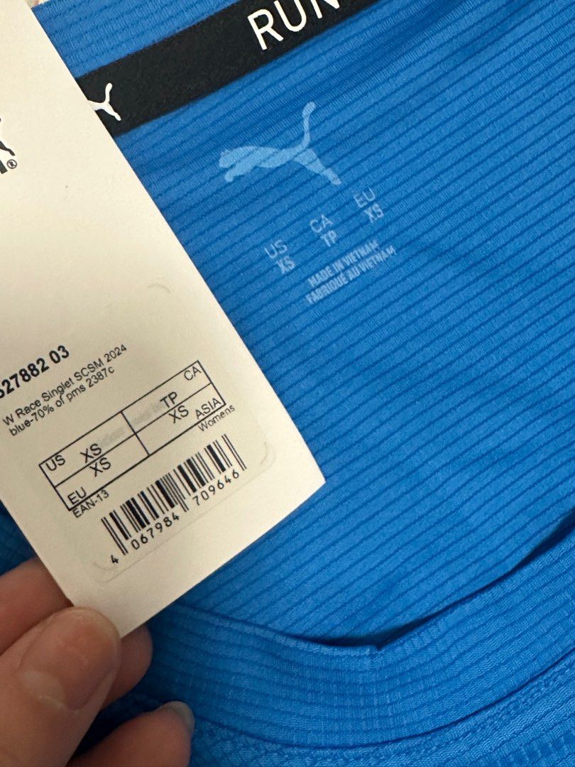 SCSM woman singlet XS (Category: Activewear) located in Singapore. Submitted by zhangjk (Listing ID 1340651485, Image 3). Description: Woman - XS Brand new.