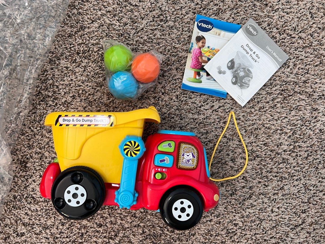Vtech drop and go dump truck (Category: Kids Toys) located in Cavite. Submitted by fordeclutter (Listing ID 1340658651, Image 2). Description: New- Open box One vtech drop and go dump tryck 3 rocks User manual With melody push buttons .