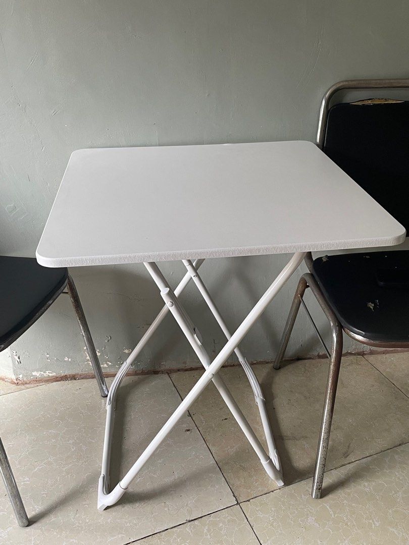 White Nordic Foldable Dining Table (Category: Tables & Sets) located in Las Pinas. Submitted by btanbae (Listing ID 1340534082, Image 2). Description: Newly bought at 938 pesos RFS: Has small dent upon receiving and smaller than expected LxWxH: 80*80*74cm.