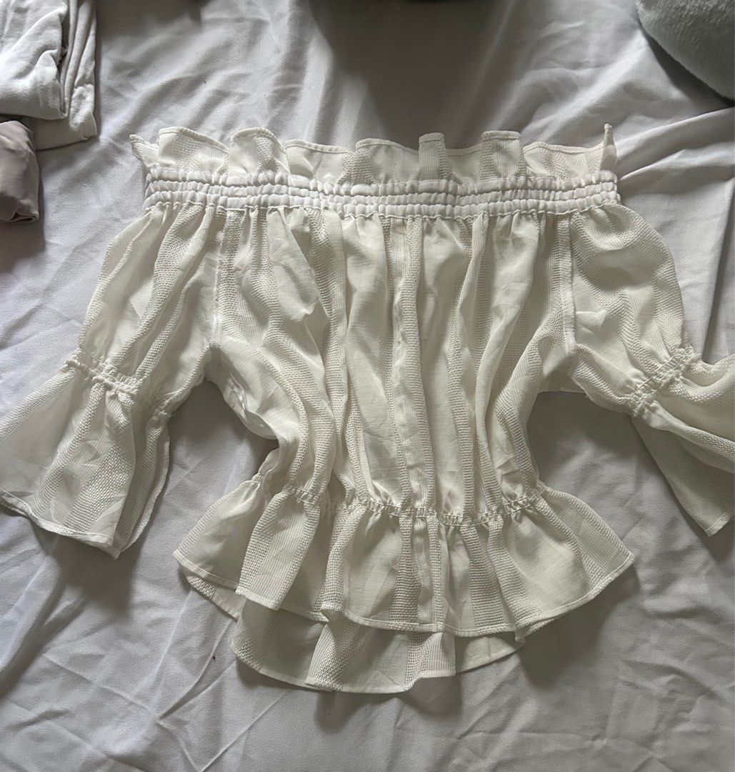 white off shoulder blouse (Category: Blouses) located in Santo Niño. Submitted by starrin (Listing ID 1340539775, Image 1). Description: used twice.