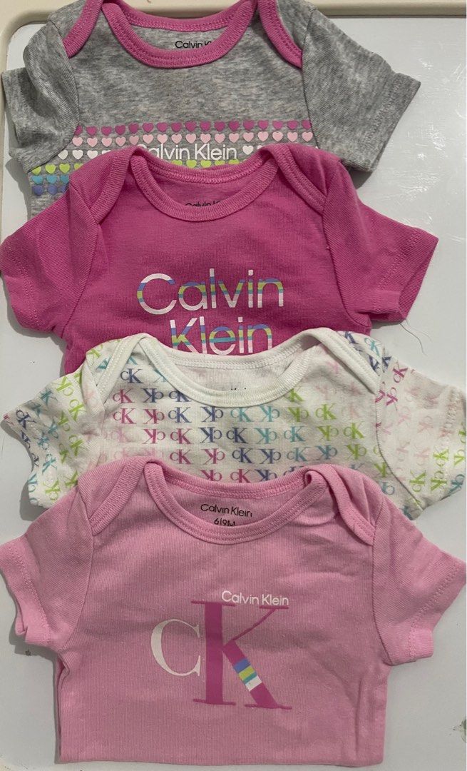 Calvin Klein Onesie (Category: Babies & Kids Fashion) located in Candaba. Submitted by bibiboop (Listing ID 1340835774, Image 1). Description: 6 months on tag.