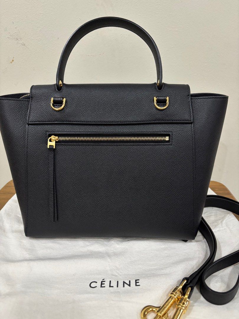 Celine Micro Belt Bag (Category: Luxury Bags & Wallets) located in Las Pinas. Submitted by bellagirl28 (Listing ID 1340860329, Image 3). Description: Celine Micro Belt Bag in black grained calfskin leather Hand carry, shoulder carry and cross-body carry Flap closure w/ hidden metallic piece and zipped closure under the flap Outer zipped pocket on the back Removable leather strap w 20inch drop Handle w 4inch drop Suede calfskin lining Gold finishi