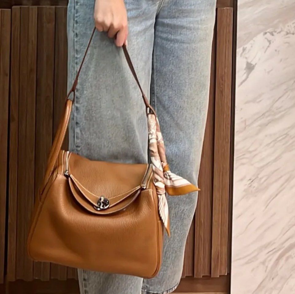 Hermes Lindy 26 Gold SHW (Category: Luxury Bags & Wallets) located in Quezon City. Submitted by __12345 (Listing ID 1340843715, Image 1). Description: - Preorder (2 weeks eta) - 9.5/10 condition - Stamp C - Includes dustbag, box, and certificate of authenticity - Available for meet ups/delivery - Detailed photos available upon request - Guaranteed authentic or money back! Open to sourcing requests! Send us a message 💌🛍️.
