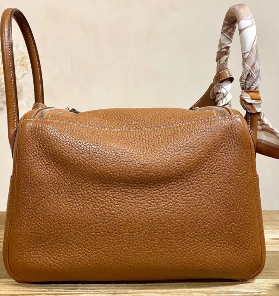 Hermes Lindy 26 Gold SHW (Category: Luxury Bags & Wallets) located in Quezon City. Submitted by __12345 (Listing ID 1340843715, Image 3). Description: - Preorder (2 weeks eta) - 9.5/10 condition - Stamp C - Includes dustbag, box, and certificate of authenticity - Available for meet ups/delivery - Detailed photos available upon request - Guaranteed authentic or money back! Open to sourcing requests! Send us a message 💌🛍️.