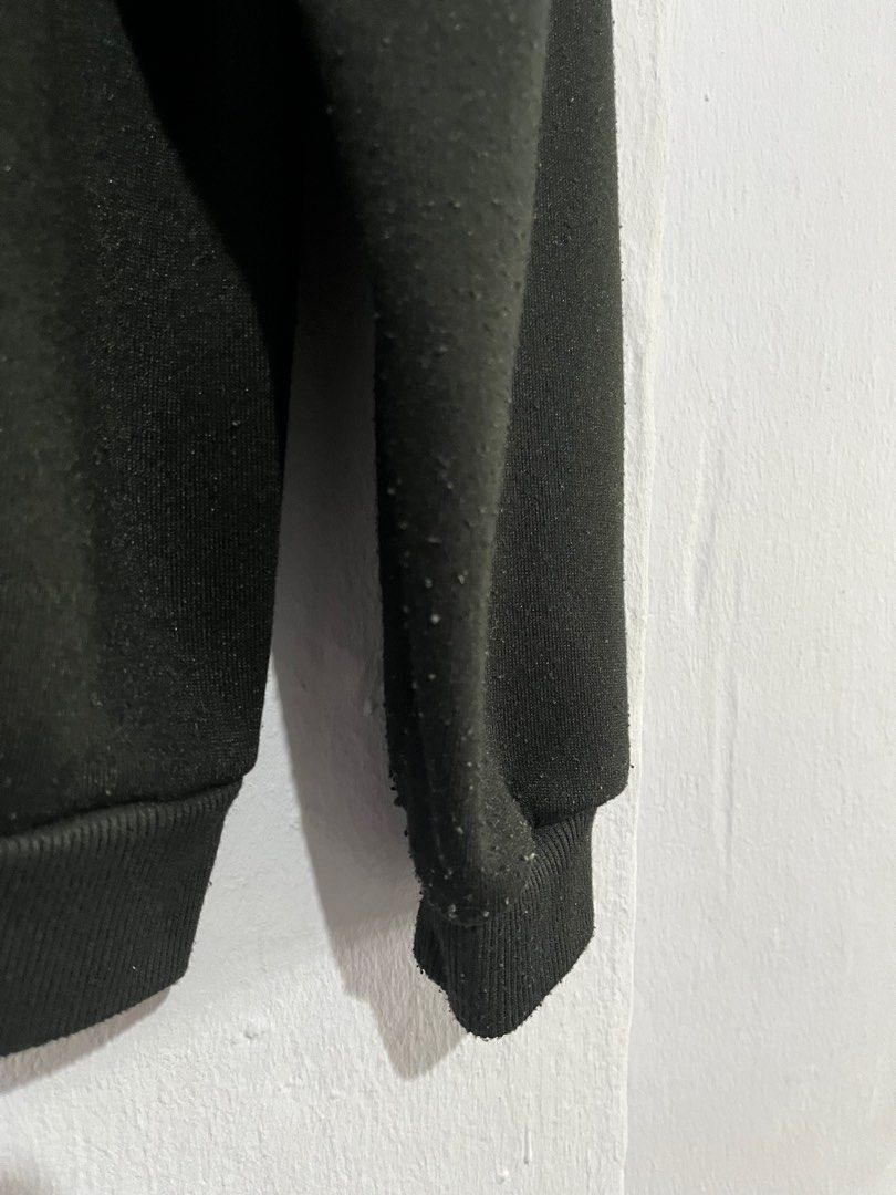 Jacket (Category: Coats, Jackets and Outerwear) located in Singapore. Submitted by curved (Listing ID 1340743886, Image 3). Description: flaws on both sleeve as seen in the 3rd pic.