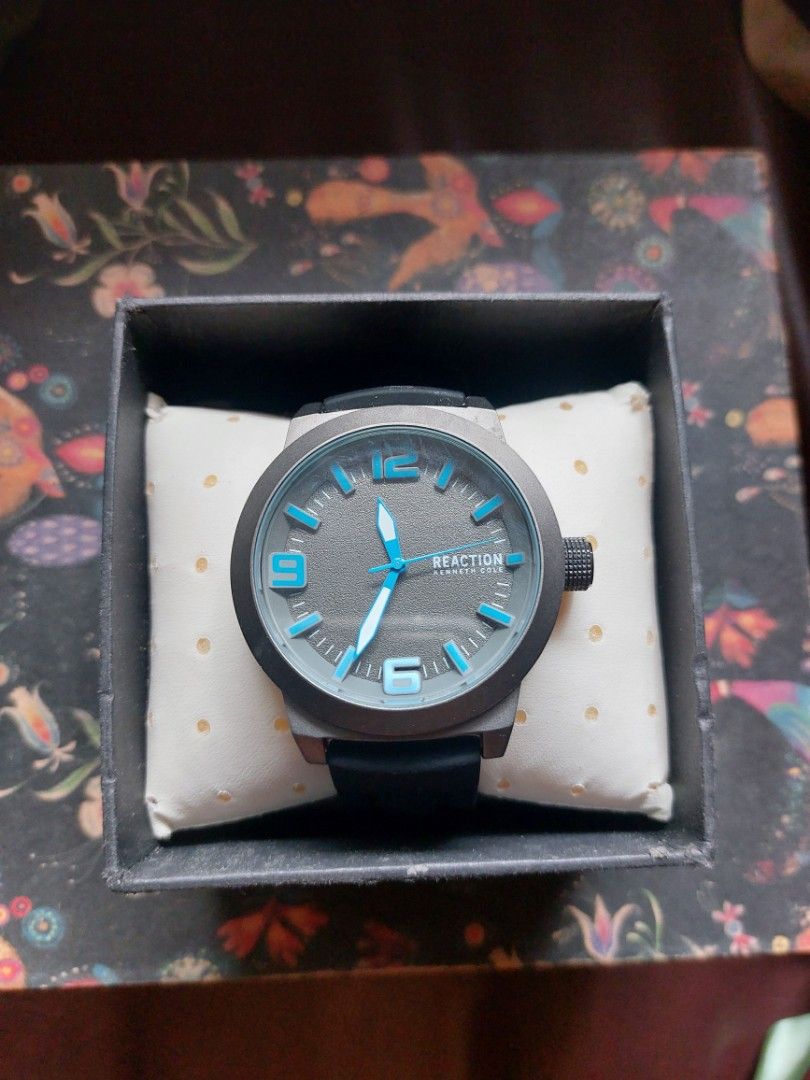 Kenneth Cole Reaction (Category: Luxury Watches) located in Makati City. Submitted by bernardcgo (Listing ID 1340690535, Image 2). Description: 💥💥PRICE NEGOTIABLE! 💥💥 Kenneth Cole reaction watch - brand new never been worn, received as a gift from the US. Watch has no batteries, still has plastic protector at the back. Comes with box and all documents The watch is made of Stainless steel, with a rubber strap..