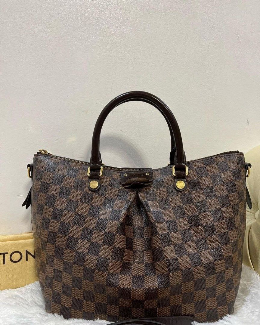 LV Siena Damier / Lowest price (Category: Luxury Bags & Wallets) located in Imus. Submitted by anotherlook (Listing ID 1340688488, Image 1). Description: May initials long Strap FIXED at 35, 850 no low ballers ! SALE ALREADY - pick up, Imus Cavite no meet up, no cod be a responsible buyer.