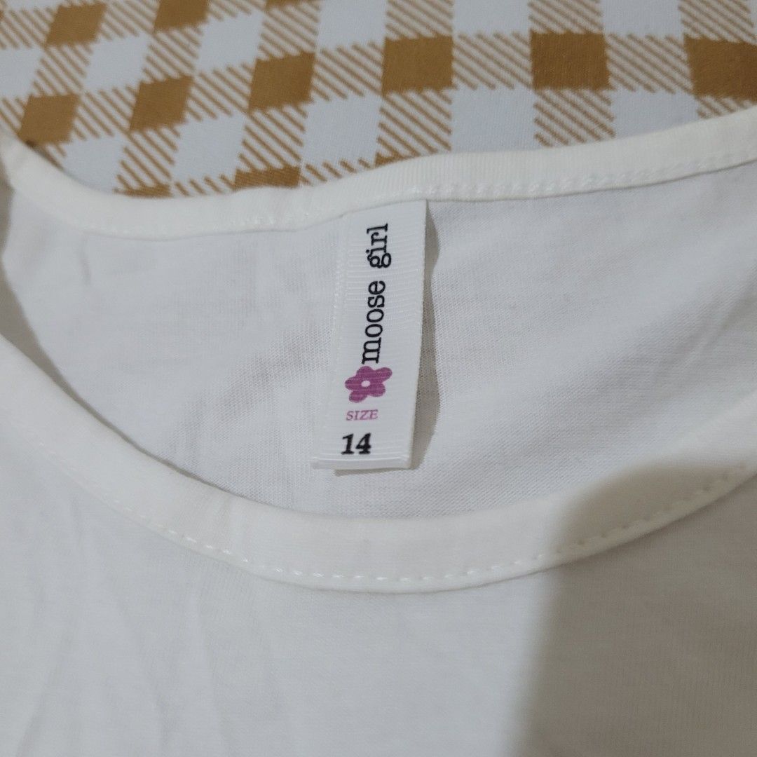 Moos Girl White Shirt (Category: Shirts) located in Quezon City. Submitted by mrjdeclutter (Listing ID 1340775590, Image 3). Description: • Send me a message for sizing details and pictures for condition checking ☺️.