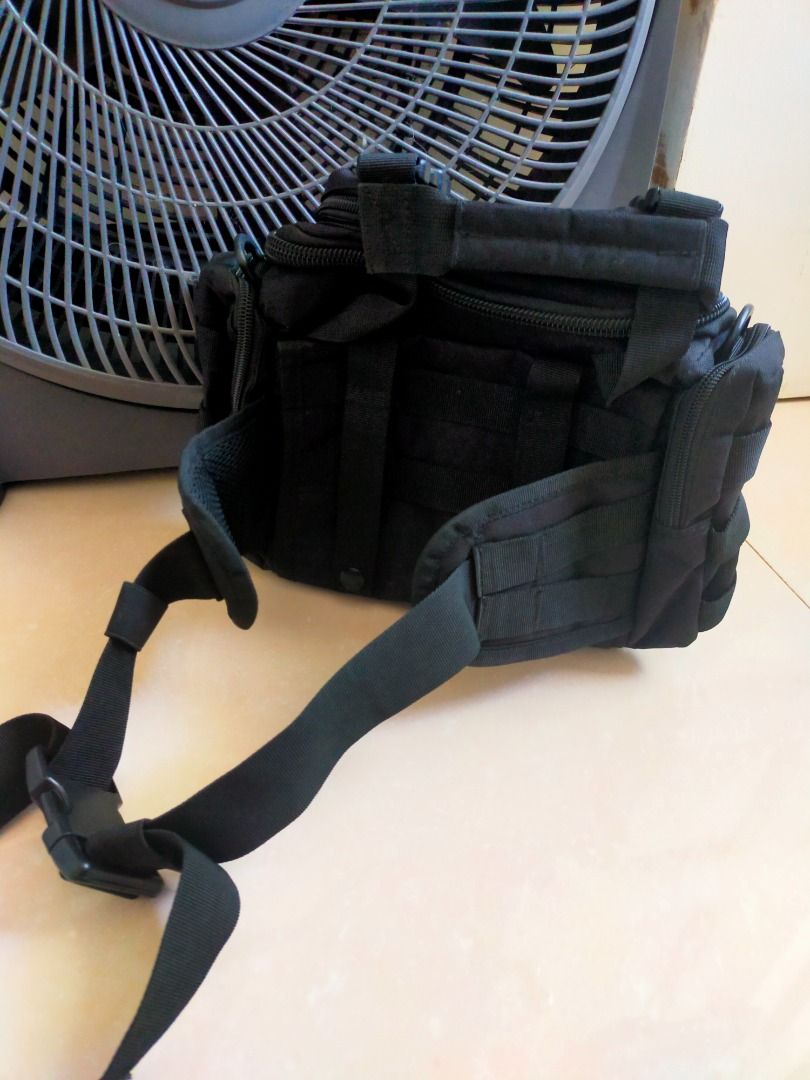 Never used Multi-purpose bag (camera bag) (Category: Camera Bags & Carriers) located in Muntinlupa City. Submitted by headstrong73 (Listing ID 1340672845, Image 2). Description: **For Sale: Never Used Compact Tactical Range Duffle Bag by Fieldcraft** This Fieldcraft tactical duffle bag is in like-new condition, never used (without tag). It features military MOLLE webbing and plenty of compartments to organize your gear, including space for pistol
