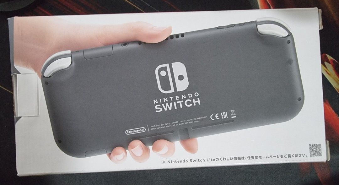 Nintendo Switch lite with free tempered glass (Category: Nintendo) located in Pasig City. Submitted by reliancebeverages (Listing ID 1340779336, Image 2). Description: selling Nintendo switch lite with tempered glass, also willing to trade for Nintendo switch Oled.