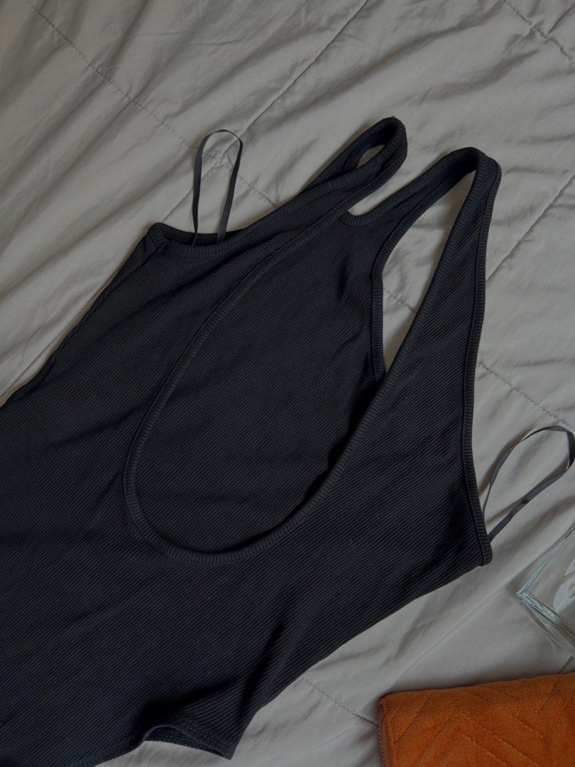 Preloved shoulder cut-out body suit (Category: Bikinis & Swimsuits) located in Manila. Submitted by katyyydeclutters (Listing ID 1340766575, Image 3). Description: - Size S on tag - SF will be shouldered by the buyer Please manage your expectations since I’m selling personal pre-loved items, ty.🫶🏻.
