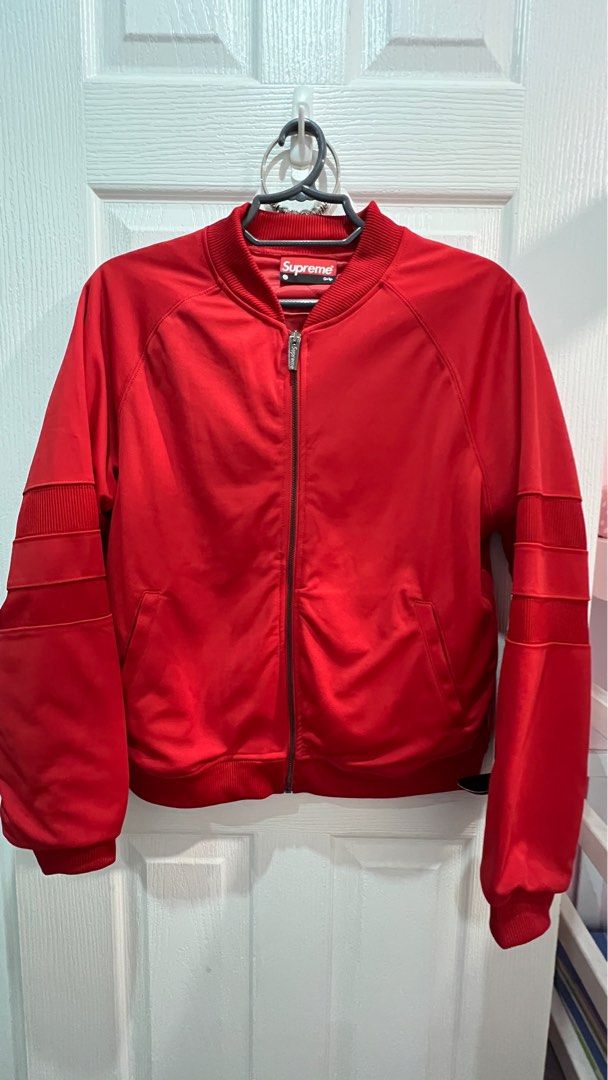 Supreme Grip bomber jacket red (Category: Coats, Jackets and Outerwear) located in Imus. Submitted by uncertainty (Listing ID 1340756411, Image 1). Description: Like new but was never used outside so its 99% fresh. Bought in Dubai as pasabuy, but didn’t fit me. Size is L but I think this fits Medium. Can do shipping or meetup in Imus/Bacoor only. 21x24in Clean stitches, no stain.