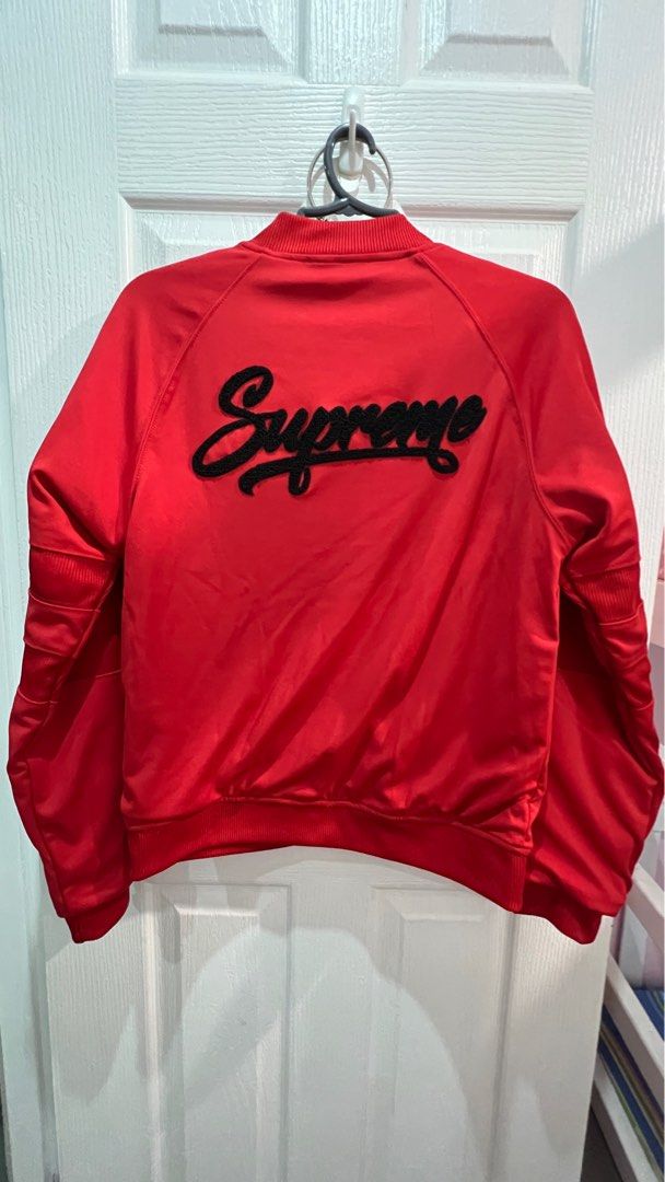 Supreme Grip bomber jacket red (Category: Coats, Jackets and Outerwear) located in Imus. Submitted by uncertainty (Listing ID 1340756411, Image 2). Description: Like new but was never used outside so its 99% fresh. Bought in Dubai as pasabuy, but didn’t fit me. Size is L but I think this fits Medium. Can do shipping or meetup in Imus/Bacoor only. 21x24in Clean stitches, no stain.