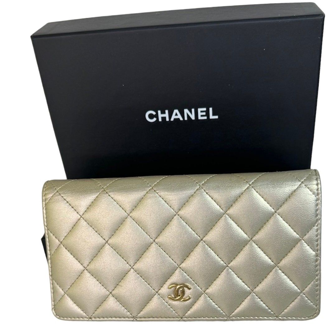 Authentic CHANEL bifold wallet (Category: Luxury Bags & Wallets) located in Quezon City. Submitted by manerarestorationservices (Listing ID 1283581098, Image 1). Description: SELLING FOR ONLY 🔥🔥🔥17,500🔥🔥🔥 Money back Guarantee 💯% Guaranteed authentic *Brand: CC Bifold Wallet 19s --MISSING HOLO-- *Materials: Lambskin *Color: metalic gold *Size: long ng compact *Condition: 9/10 -Used * Inclusions: box only Open for LAYAWAY 20% down payment 80